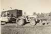 Homer Leo Koonce, hauling a load of cotton, accompanied by his ever-present dog. Picture taken in Ma