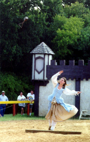 Mistress Cathren throwing in the weight-for-distance competiton at the Scarborough Highland Games